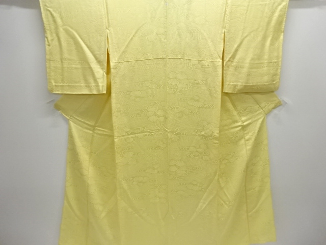 Single-colored kimono with a single pattern of flowers woven into flowing water